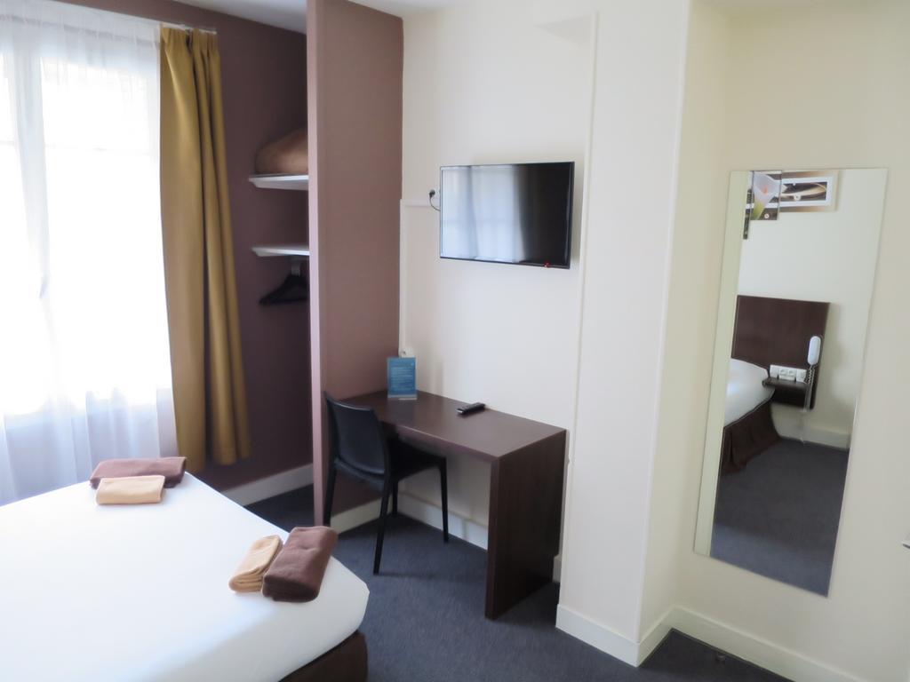 Hotel De La Paix Caen Quarto foto
