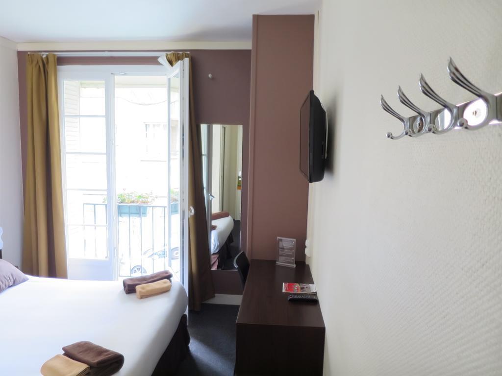 Hotel De La Paix Caen Quarto foto