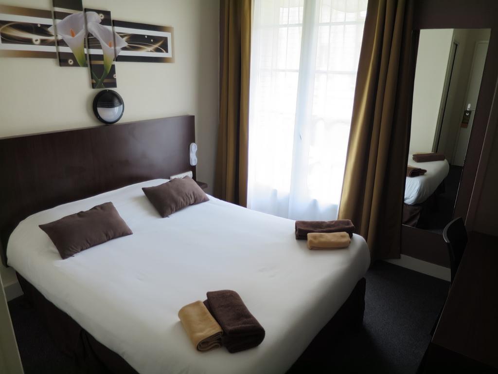 Hotel De La Paix Caen Quarto foto