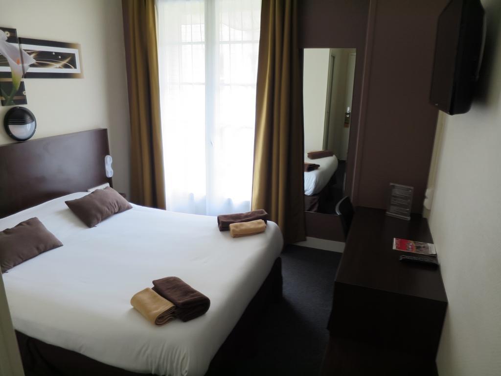 Hotel De La Paix Caen Quarto foto